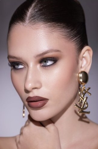 Editorial makeup look with dark lip