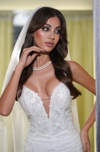 Dubai bride in lace gown with veil, bridal makeup by Beauty by Caro